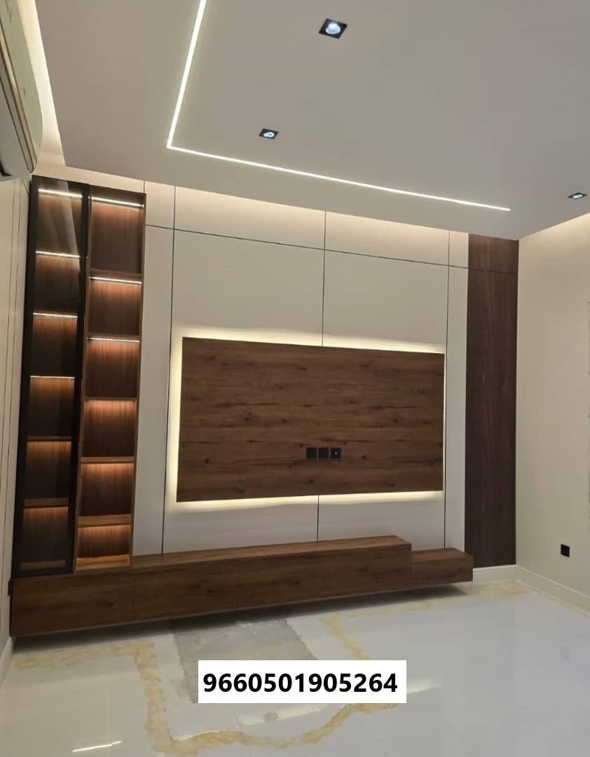 ديكور شاشات تلفزيون في جازان مع إضاءة مخفية وتصميم مودرن